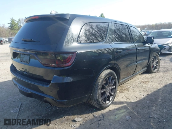 2016 Dodge Durango R/T with VIN 1C4SDJCT7GC460564, listed as a IAAI auction lot 42129759 with 134,085 mi miles and . Bid and sale history available at DreamBid. Image 4.