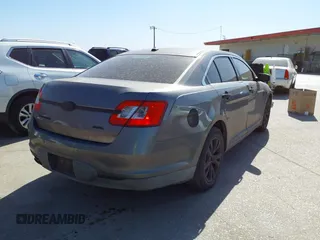2011 Ford Taurus SEL with VIN 1FAHP2EW4BG183541, listed as a IAAI auction lot 41832302 with 185,085 mi miles. Bid and sale history available at carsss.com. Image 4.
