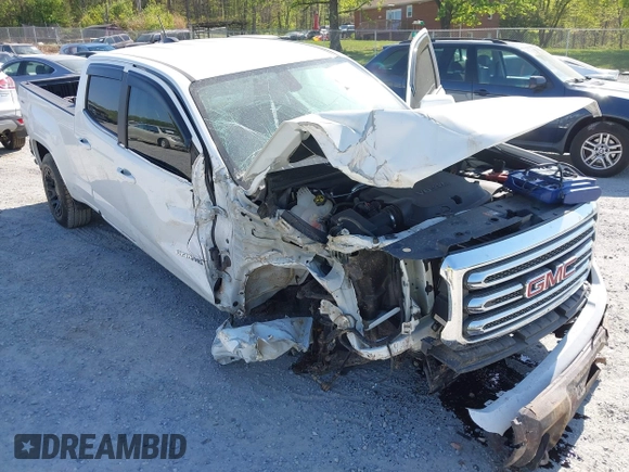 2019 GMC Canyon 4WD SLE z VIN 1GTG6CEN0K1353094, wystawiony jako IAAI lot #42065160 z przebiegiem 73 235 mil mil oraz . Historia ofert i sprzedaży dostępna na DreamBid. Obrazek 6.
