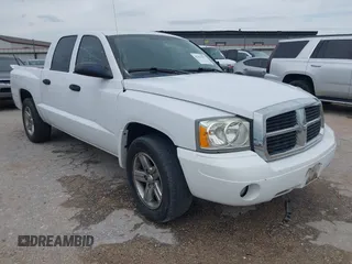 2007 Dodge Dakota SLT z VIN 1D7HE48K87S192659, wystawiony jako IAAI lot #42454297 z przebiegiem 198 824 mil mil oraz . Historia ofert i sprzedaży dostępna na DreamBid. Obrazek 1.