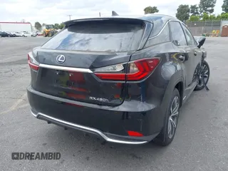2022 Lexus RX with VIN 2T2HGMDA1NC090258, listed as a IAAI auction lot 36253855 with 8,565 mi miles. Bid and sale history available at carsss.com. Image 4.