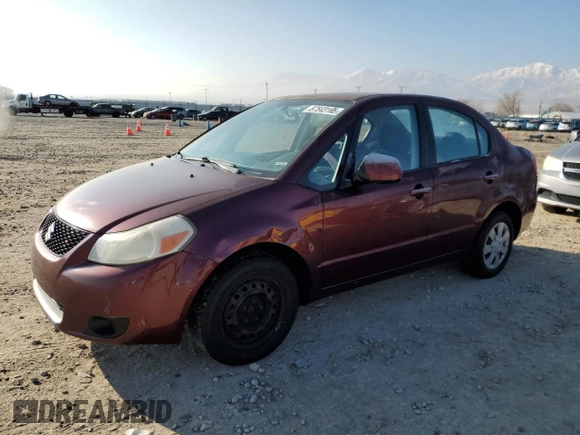 2009 Suzuki SX4 Man FWD with VIN JS2YC412696201399, listed as a Copart auction lot 87543165 with 150,739 mi miles and Salvage Title. Bid and sale history available at carsss.com. Image 1.
