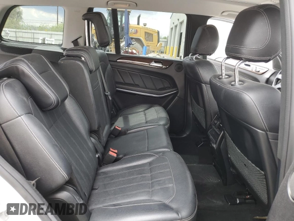 2014 Mercedes-Benz GL 450 z VIN 4JGDF7CE4EA314084, wystawiony jako Copart lot #59593195 z przebiegiem 161 026 mil mil oraz Szkoda całkowita • Salvage title. Historia ofert i sprzedaży dostępna na DreamBid. Obrazek 11.