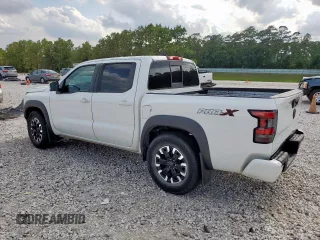 2022 Nissan Frontier SV with VIN 1N6ED1EJ6NN619016, listed as a Copart auction lot 58311855 with 56,943 mi miles and Clean title. Bid and sale history available at DreamBid. Image 2.