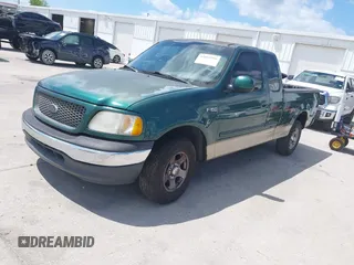 2000 Ford F-150 XL with VIN 1FTZX1729YNB93649, listed as a IAAI auction lot 42069599 with 1 mi miles. Bid and sale history available at carsss.com. Image 2.