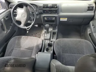 2000 Honda Passport LX with VIN 4S6CK58WXY4411135, listed as a Copart auction lot 71426994 with 214,051 mi miles and Salvage Title. Bid and sale history available at carsss.com. Image 8.
