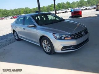 2016 Volkswagen Passat 1.8T S with VIN 1VWAS7A38GC031521, listed as a IAAI auction lot 42069429 with 94,938 mi miles. Bid and sale history available at carsss.com. Image 1.