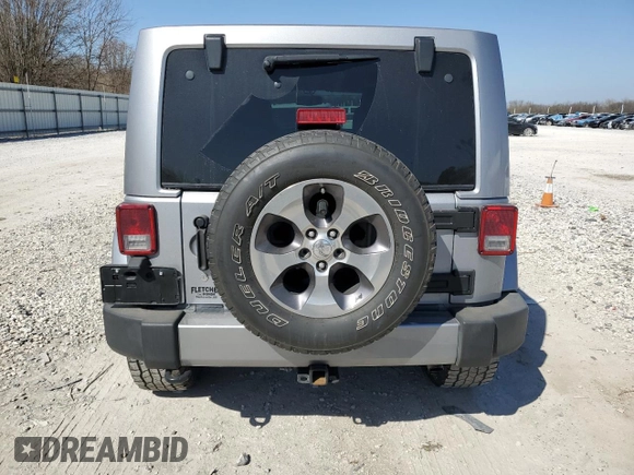 2016 Jeep Wrangler Unlimited 75th Anniversary with VIN 1C4BJWEG3GL265518, listed as a Copart auction lot 48952605 with 77,783 mi miles and Salvage title. Bid and sale history available at DreamBid. Image 6.