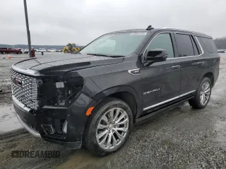 2023 GMC Yukon Denali with VIN 1GKS1DKL8PR402542, listed as a Copart auction lot 42001695 with 23,497 mi miles and Salvage Title. Bid and sale history available at carsss.com. Image 1.