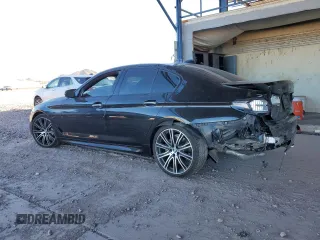 2018 BMW 5 Series 540i xDrive with VIN WBAJE7C5XJWD52054, listed as a Copart auction lot 47306535 with 49,185 mi miles and Salvage title. Bid and sale history available at DreamBid. Image 2.