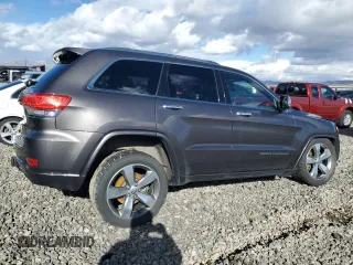 2015 Jeep Grand Cherokee Overland with VIN 1C4RJFCT4FC118184, listed as a Copart auction lot 44465045 with 143,149 mi miles and Salvage Title. Bid and sale history available at carsss.com. Image 3.