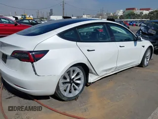 2023 Tesla Model 3 with VIN 5YJ3E1EA9PF640015, listed as a IAAI auction lot 41622086 with 15,622 mi miles and . Bid and sale history available at carsss.com. Image 6.