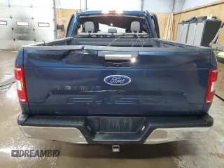 2018 Ford F-150 XL with VIN 1FTFX1E57JFE75983, listed as a Copart auction lot 52619685 with 184,124 mi miles and Clean title. Bid and sale history available at DreamBid. Image 6.