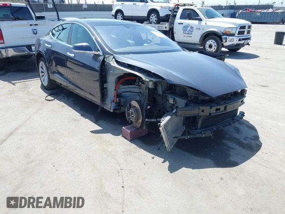2016 Tesla Model S 90D with VIN 5YJSA1E22GF138236, listed as a IAAI auction lot 42532245 with 72,839 mi miles and . Bid and sale history available at DreamBid. Image 6.