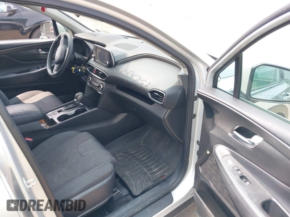 2019 Hyundai Santa Fe SE z VIN 5NMS2CAD2KH058961, wystawiony jako IAAI lot #42395683 z przebiegiem 81 228 mil mil oraz . Historia ofert i sprzedaży dostępna na DreamBid. Obrazek 5.
