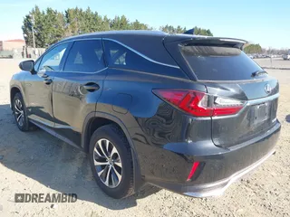 2022 Lexus RX with VIN JTJHZKFA7N2037057, listed as a IAAI auction lot 41804899 with 157,549 mi miles. Bid and sale history available at carsss.com. Image 3.
