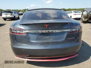 2019 Tesla Model S 100D с VIN 5YJSA1E42KF312803, выставлен на аукционе Copart как лот 71246484 с пробегом 89 820 миль миль и На запчасти • Non repairable. История ставок и продаж доступна на DreamBid. Изображение 6.