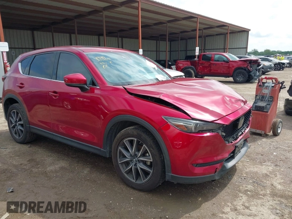 2018 Mazda CX-5 Grand Touring with VIN JM3KFADM7J1357401, listed as a IAAI auction lot 42106012 with 119,420 mi miles and . Bid and sale history available at DreamBid. Image 1.