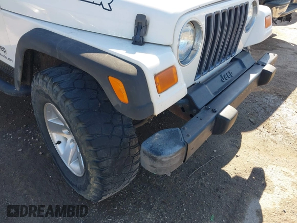 2005 Jeep Wrangler SE with VIN 1J4FA29S95P363770, listed as a IAAI auction lot 41362056 with 140,540 mi miles. Bid and sale history available at carsss.com. Image 6.