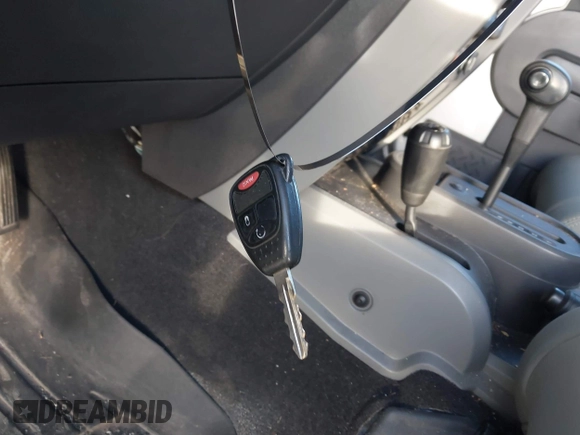 2010 Jeep Wrangler Unlimited Sahara with VIN 1J4BA5H14AL230604, listed as a IAAI auction lot 41884346 with 97,060 mi miles. Bid and sale history available at carsss.com. Image 11.