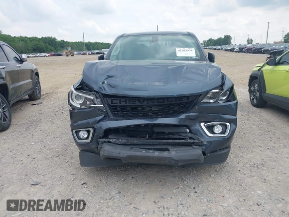 2019 Chevrolet Colorado 4WD Z71 with VIN 1GCGTDEN5K1328061, listed as a IAAI auction lot 42505934 with 76,520 mi miles and . Bid and sale history available at DreamBid. Image 6.