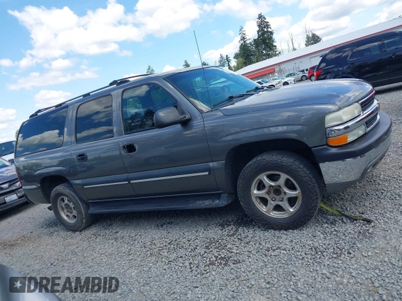 2002 Chevrolet Suburban LS z VIN 3GNEC16Z62G255198, wystawiony jako IAAI lot #42312829 z przebiegiem 192 459 mil mil oraz . Historia ofert i sprzedaży dostępna na DreamBid. Obrazek 13.