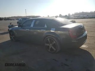 2005 Chrysler 300 with VIN 2C3JA53GX5H563815, listed as a Copart auction lot 81886344 with 144,630 mi miles and Salvage Title. Bid and sale history available at carsss.com. Image 2.