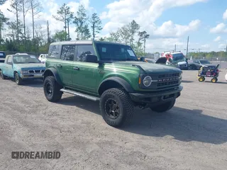 2023 Ford Bronco with VIN 1FMEE5DP5PLB15371, listed as a IAAI auction lot 41911126 with 32,091 mi miles. Bid and sale history available at carsss.com. Image 1.
