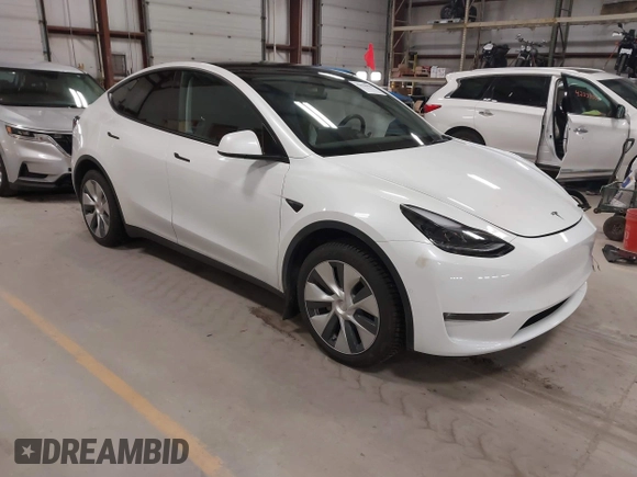 2022 Tesla Model Y Long Range z VIN 7SAYGDEE3NF358487, wystawiony jako IAAI lot #42036969 z przebiegiem 52 723 mil mil oraz . Historia ofert i sprzedaży dostępna na DreamBid. Obrazek 1.