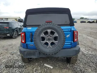 2021 Ford Bronco with VIN 1FMDE5BH9MLB02593, listed as a Copart auction lot 59632675 with 64,833 mi miles and Salvage title. Bid and sale history available at DreamBid. Image 6.