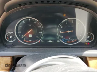2014 BMW 7 Series 740i z VIN WBAYA6C51ED144132, wystawiony jako Copart lot #55131365 z przebiegiem 116 826 mil mil oraz Szkoda całkowita • Salvage title. Historia ofert i sprzedaży dostępna na DreamBid. Obrazek 9.