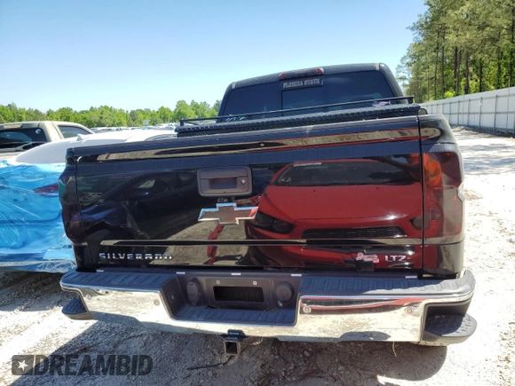 2015 Chevrolet Silverado 1500 LTZ with VIN 3GCUKSEC2FG504886, listed as a Copart auction lot 46433495 with 131,475 mi miles and Salvage Title. Bid and sale history available at DreamBid. Image 6.