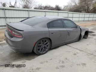2020 Dodge Charger SXT with VIN 2C3CDXBG1LH114890, listed as a Copart auction lot 42984485 with 63,374 mi miles and Salvage Title. Bid and sale history available at carsss.com. Image 3.