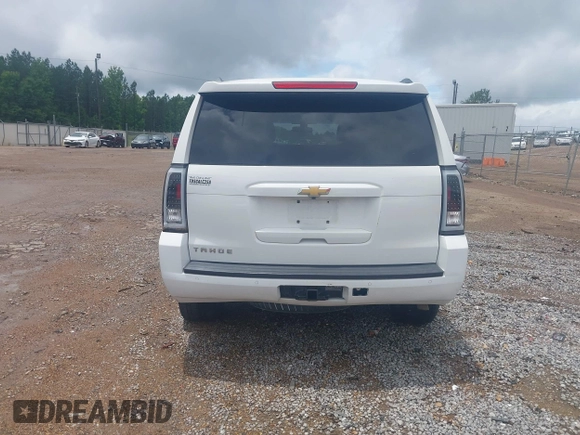 2017 Chevrolet Tahoe LS with VIN 1GNSCAKC7HR342637, listed as a IAAI auction lot 42335097 with 149,736 mi miles and . Bid and sale history available at DreamBid. Image 16.