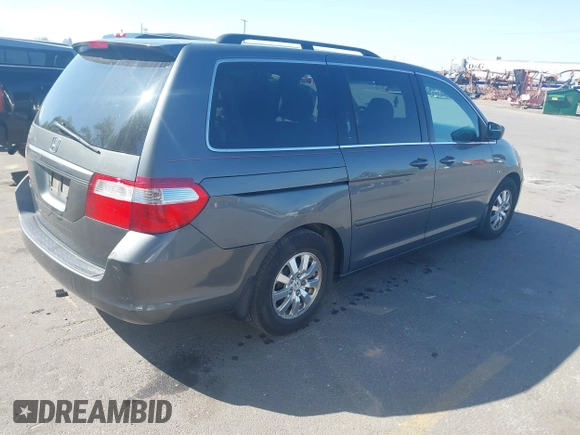 2007 Honda Odyssey EX-L with VIN 5FNRL38777B140916, listed as a IAAI auction lot 42159976 with 167,541 mi miles. Bid and sale history available at carsss.com. Image 4.