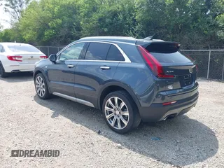 2019 Cadillac XT4 FWD Premium Luxury z VIN 1GYFZCR43KF143980, wystawiony jako IAAI lot #42472400 z przebiegiem 36 496 mil mil oraz . Historia ofert i sprzedaży dostępna na DreamBid. Obrazek 3.