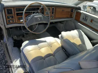 1980 Cadillac Eldorado z VIN 6L578AE609480, wystawiony jako Copart lot #58422345 z przebiegiem 85 604 mil mil oraz Tytuł czysty. Historia ofert i sprzedaży dostępna na DreamBid. Obrazek 8.