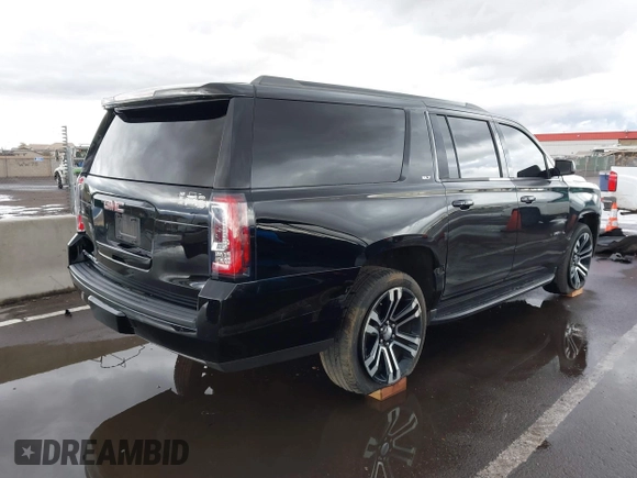2019 GMC Yukon XL SLT with VIN 1GKS1GKC7KR155668, listed as a IAAI auction lot 41751792 with 163,537 mi miles. Bid and sale history available at carsss.com. Image 4.