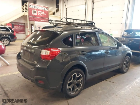 2015 Subaru XV Crosstrek Limited with VIN JF2GPASC8F8242439, listed as a IAAI auction lot 41787469 with 148,828 mi miles. Bid and sale history available at carsss.com. Image 4.