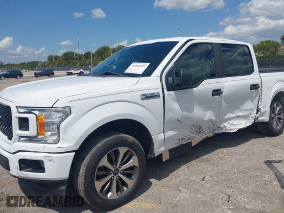 2019 Ford F-150 XL with VIN 1FTEW1CP9KKC27035, listed as a IAAI auction lot 41994993 with 125,879 mi miles and . Bid and sale history available at carsss.com. Image 2.