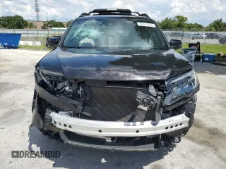 2021 Honda Passport EX-L with VIN 5FNYF7H58MB005187, listed as a Copart auction lot 60414535 with 75,208 mi miles and Salvage title. Bid and sale history available at DreamBid. Image 5.