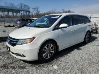 2014 Honda Odyssey Touring with VIN 5FNRL5H9XEB036821, listed as a Copart auction lot 49167125 with 169,472 mi miles and Salvage Title. Bid and sale history available at carsss.com. Image 1.