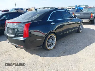 2014 Cadillac ATS Luxury RWD z VIN 1G6AB5RX6E0130354, wystawiony jako IAAI lot #41605992 z przebiegiem 234 093 mil mil oraz . Historia ofert i sprzedaży dostępna na DreamBid. Obrazek 4.