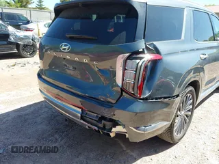 2023 Hyundai Palisade Calligraphy с VIN KM8R7DGE1PU502462, выставлен на аукционе IAAI как лот 42282103 с пробегом 69 487 миль миль и . История ставок и продаж доступна на DreamBid. Изображение 6.