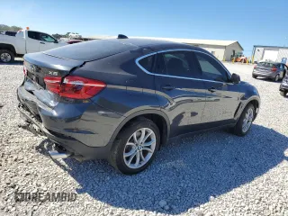 2016 BMW X6 sDrive35i with VIN 5UXKU0C5XG0F92975, listed as a Copart auction lot 74890804 with 64,231 mi miles and Salvage Title. Bid and sale history available at carsss.com. Image 3.