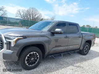 2024 Toyota Tundra 4WD SR5 with VIN 5TFLA5DB6RX177580, listed as a IAAI auction lot 41874283 with 6,880 mi miles. Bid and sale history available at carsss.com. Image 14.