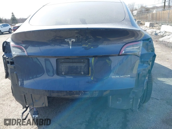 2023 Tesla Model Y Performance with VIN 7SAYGDEF7PF590750, listed as a IAAI auction lot 41694002 with Not Provided miles and . Bid and sale history available at DreamBid. Image 16.