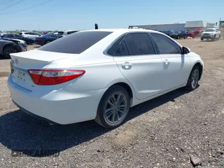 2015 Toyota Camry XLE with VIN 4T1BF1FK2FU895574, listed as a IAAI auction lot 41993588 with 107,377 mi miles. Bid and sale history available at carsss.com. Image 4.