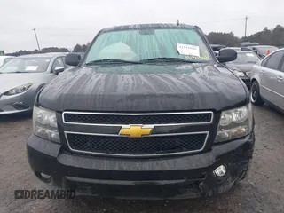 2014 Chevrolet Suburban LT with VIN 1GNSCJE06ER233762, listed as a IAAI auction lot 41515686 with 125,442 mi miles. Bid and sale history available at carsss.com. Image 12.