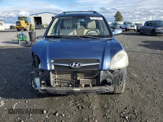 2009 Hyundai Tucson SE with VIN KM8JN72D89U977046, listed as a Copart auction lot 80712994 with 60,863 mi miles and Salvage Title. Bid and sale history available at carsss.com. Image 5.